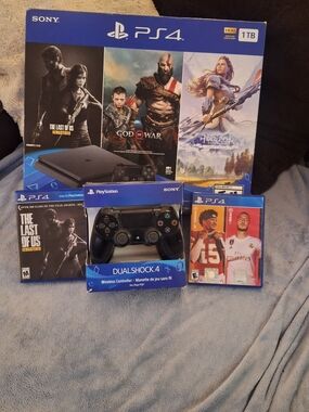 PS4 Slim 1TB, 2 Playstation Controllers, 3 Games, All Cords and Chargers